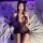 Woman wearing mannyan sexy lace bodysuit with deep v-neck and sheer bodycon skirt, styled as ol secretary costume on bed with...
