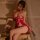 Elegant red lace cheongsam bodysuit with sheer halter neck, mandarin collar, and high slit design, perfect for festive celebr...