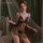 Woman modeling mannyan sexy lace sleep dress – sheer mesh nightgown with open-crotch, cut-outs & adjustable straps.