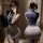 Woman modeling mannyan sexy lingerie set – navy top & gray pencil skirt, front and back view in mirror.
