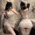 Woman wearing mannyan sexy lingerie set – white ruffled off-shoulder wrap skirt & halter top, with cat ears and lace stocking...