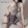 Mannyan sexy lingerie set: mesh bodysuit with tie-neck and pleated jk-style skirt, paired with thigh-high fishnets.