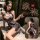 Woman wearing mannyan sheer lingerie set, an elegant chinese qipao costume with vintage allure, styled as a tight nightclub m...