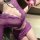 Woman wearing purple mannyan yujie sheer mesh bodycon dress with deep v neckline and lace trim, sexy lingerie outfit.