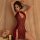 Sexy red lace cheongsam outfit featuring sheer cut-outs and traditional knotted buttons, perfect for elegant evening wear.