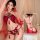 Woman modeling red sheer mesh halter lingerie set with floral embroidery and tassels, chinese style design.