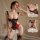 Woman modeling red and black lace bodysuit with underwire cups, open crotch, garter straps, and bow details for romantic nigh...