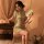 Elegant vintage-inspired cheongsam in sheer fabric, featuring delicate embroidery and high neck design, perfect for retro-the...