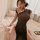 Elegant black sheer cheongsam lingerie with lace cut-outs, vintage-inspired design, perfect for sensual wear.