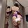 Woman wearing purple mannyqing lace-trimmed silk bra and panty set with sheer mesh, floral embroidery, open back, garters, an...