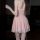 Woman wearing pink mannyqing lingerie dress - pure temptation halter neck mesh slip dress, showcasing its low-cut back and fl...