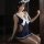 Sailor-style jumpsuit featuring lace-up design, bow detail, and cutout elements, perfect for playful elegance.