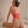 Sexy nurse bodysuit with lace details and red accents, perfect for sleepwear or intimate wear. features a charming bow headba...