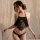 Woman wearing black lace camisole and crotchless panties, sheer sexy sleepwear set by mannyqing for intimate nights.