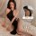 High-waisted slit jumpsuit featuring sexy bodycon design, bare shoulders, and back detail for sensual allure.