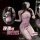 A woman wearing a pink bodycon dress with floral designs, featuring sheer lace details and a strapless design, ideal for slee...