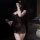 Sensual woman wearing mannyqing qqny sheer lace babydoll nightgown with bow, featuring thin mesh design for elegant sleepwear...