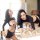 Two women modeling the mannyqing sheer black lingerie set with open-crotch thong and blood-drop design, posing seductively on...