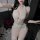 Woman wearing mannyqing sensual deep v lace bodysuit with sheer mesh, cross-tie front, and open-crotch design for passionate ...