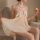 Woman wearing mannyqing sheer mesh lace cami nightdress with backless and cutout design, elegant summer sleepwear.