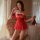 Sexy strapless red christmas-themed bodycon dress with shiny mesh fabric and festive tie details, perfect for holiday celebra...