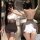Woman modeling manyan pure & tempting halter neck bodycon skirt set with sheer backless design, fluffy cloud accents, and mir...
