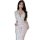 A woman wearing a white lace sleep dress with deep v-neckline and high waist, featuring sheer fabric and floral patterns. inc...