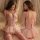 Pink lace bodysuit set with corset waist trainer, sheer sleep dress, and fishnet stockings for women.