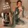 Woman wearing green snake print bodysuit lingerie set, mei xing qing pure & tempting small-bust enhancing cosplay lingerie.