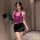 A woman models a meinaer plus size seductive backless lace set, featuring a deep v-neck halter top and a black mini skirt, cr...