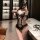 Sexy lace bodysuit with open crotch design, perfect for maid costumes or sleepwear. elegant black lace details add allure.