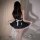 Sexy maid costume featuring a black lace babydoll dress with a white bow, detachable apron, and headband set.