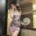A woman poses elegantly in a floral-patterned mi zhi lian sensual lingerie set, featuring a qipao-inspired design. the modest...