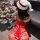A woman wearing a red sheer bodycon mini dress with intricate patterns, perfect for festive occasions like christmas and new ...