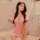A woman models a pink nurse costume set, featuring a soft girl uniform with a removable seductive outfit ideal for cosplay an...
