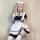 A woman poses wearing a miyano plus size japanese-style cosplay maid dress, featuring black and white colors with ruffles and...