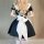 Back view of a woman wearing a black and white maid dress with puffy sleeves, a large bow at the waist, and knee-high socks, ...