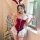 Sexy festive nightwear costume featuring a red holiday dress with white fur accents and bunny ears, perfect for new years eve...