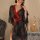 Elegant black kimono-style sleepwear featuring intricate floral embroidery, red satin accents, and a no-remove design for a l...