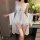 Elegant white sheer mesh halter nightgown with lace detailing, paired with a matching silk robe, creating a luxurious and sed...