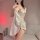 Satin night dress with tie-strap design, v-neckline, and irregular hem, perfect for alluring pure-yu style sleepwear.