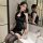 Vintage-inspired black cheongsam style lingerie set featuring sheer fabric, elegant gold embroidery, and cut-out details for ...