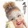 Woman wearing a white lace cut-out blindfold mask, part of the nightclub queen lingerie set, perfect for parties and role pla...