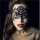 Woman wearing black lace blindfold mask from nightclub queen lingerie set, perfect for parties and role play.