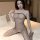 Sexy mesh bodysuit for women featuring an open-crotch design, perfect for evening wear with a touch of allure.