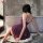 Woman in purple shiny lace slip dress, back view, sitting by bathtub. nightse sexy lace slip dress - shiny clubwear bodysuit ...