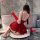 Woman in red lace slip dress with matching gloves, posing on bathroom floor. nightse sexy lace slip dress - shiny clubwear bo...
