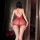 Woman wearing red lace backless halter bodysuit, elegant erotic lingerie set by nightsi nightse, sheer design with crisscross...