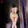 Woman in beige nightsigh lace sheer secretary outfit with back bow, bodycon skirt, and thigh-high stockings.