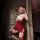 Woman posing in red nightsigh nightsere sexy lingerie dress with high slit, strapless bodycon mini design, sheer stockings.